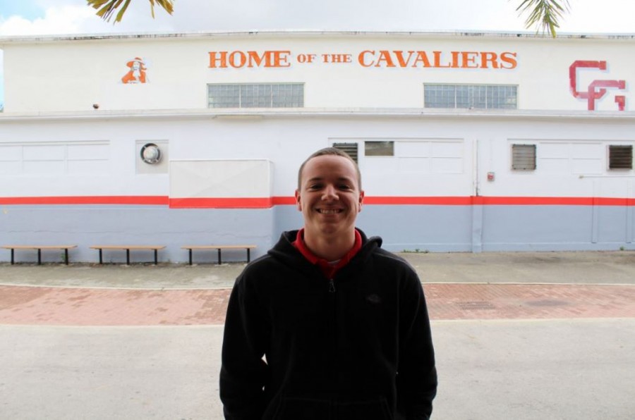 Junior Eduardo Valdes, Varsity football player says “cheese” because of their successful football season. 