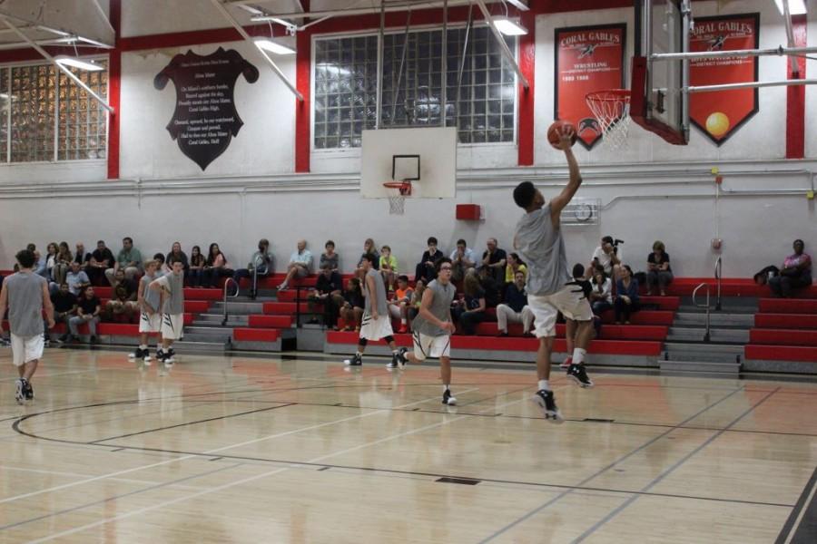 WARM UP:  The JV Basketball team getting ready for game time. From left: Sophomore Zachary Grant, Freshman Sutton Payne, Freshman Max Rego, Junior Jorge Troitino, Sophomore Leo Soyfer, and Freshman KC Hall.