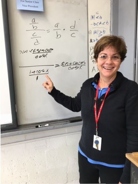 Ms. Prado loves teaching math and explaining problems to her students.