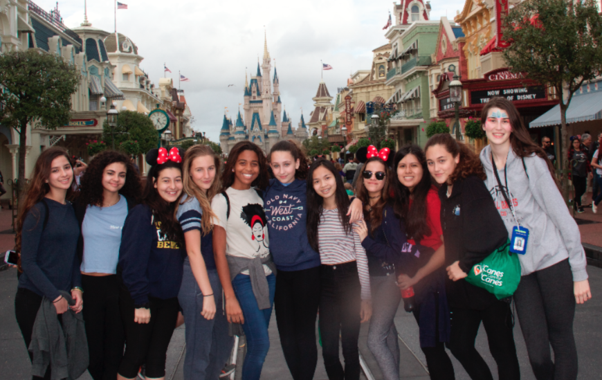 Freshmen enjoy taking a group picture alongside Cinderella's Castle.