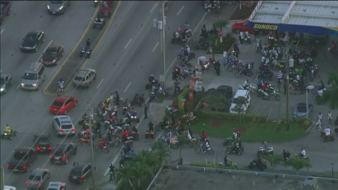 Hundreds of motor cyclists and ATV riders take pit stop.