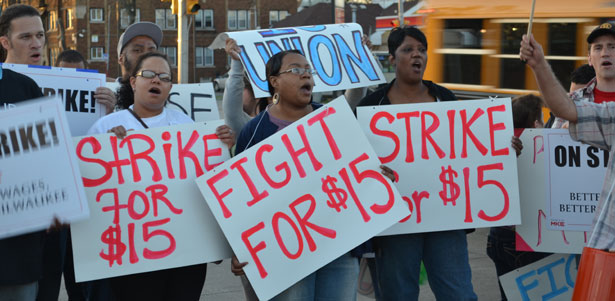 This peaceful protest in Milwaukee, Wisconsin shows fast food workers going on strike for increased wages.