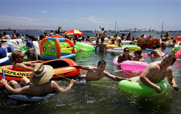 Thousands of attendees enjoy the event but forget to clean up the beaches and waters afterwards. 