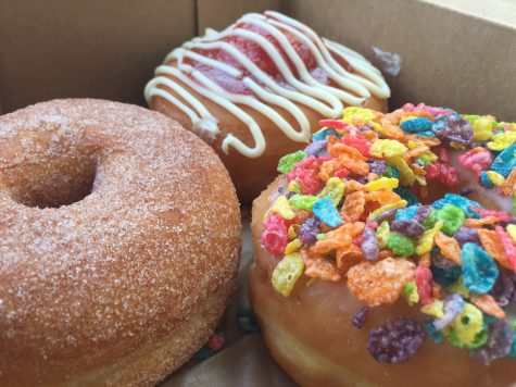 Honeybee Doughnuts' cinnamon sugar, guava with cream cheese, and frutti pebbles doughnuts.