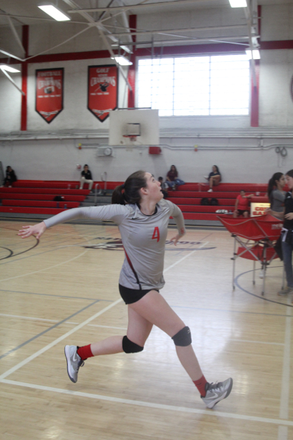 Senior Natalie Regaled playing volleyball, a fall sport. 