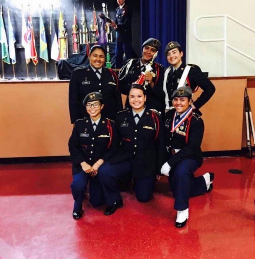 A few of JROTCs female drill members making memories at Ponce de Leon Middle School. 