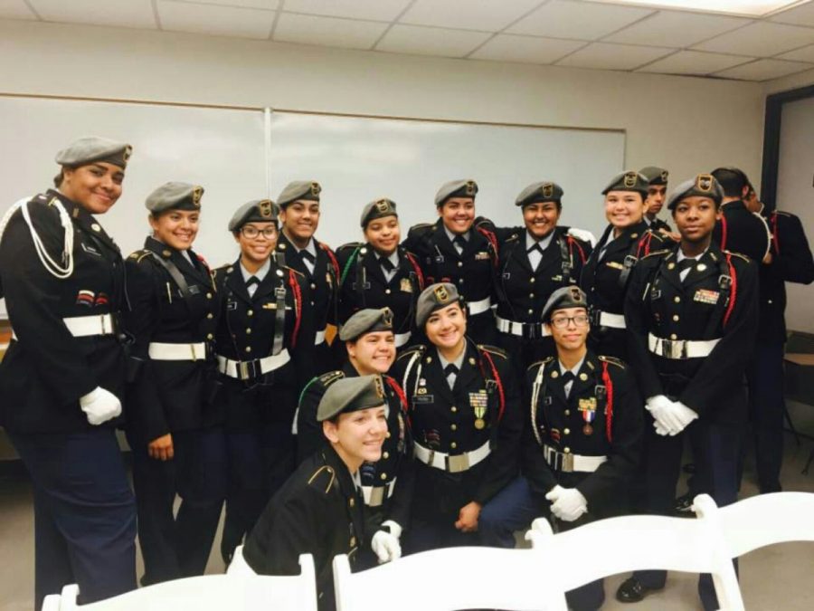 The female members of the drill team posing for a group picture.