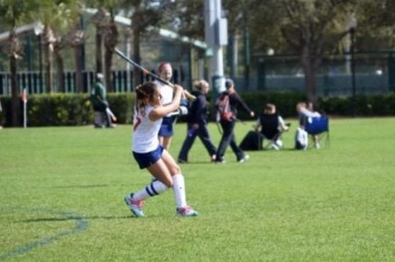 Player for the Key Biscayne Field Hockey team, Valeria Gutierrez, in action during a game.
