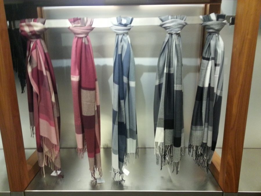 Plaid scarves look amazing with a white or ivory shirt. 
