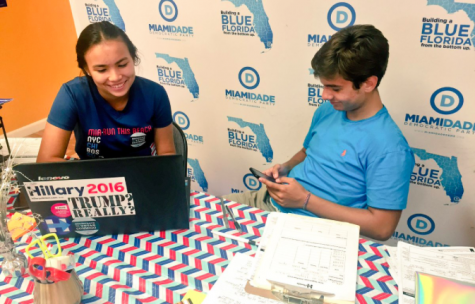 Nikita registering voters alongside sophomore Patrick Ales.
