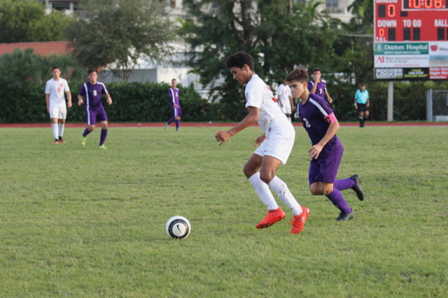 A boys soccer game in December.