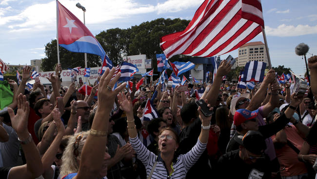 Cubans gather in front of Miamis most iconic restaurants to celebrate the death of Fidel Castro.