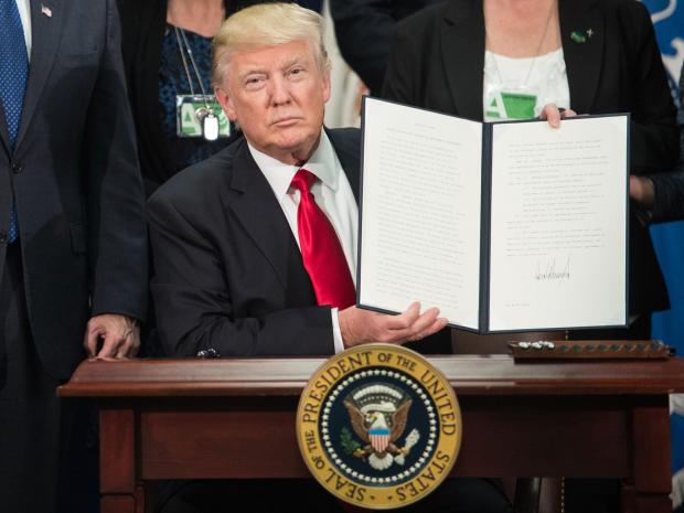 Donald Trump signed over 12 executive orders in his first week as President.