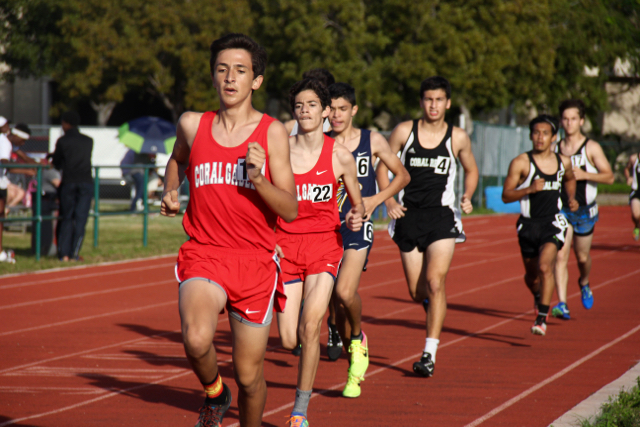 Sophomore+Anthony+Imperatori+and+junior+Mario+Garcia+participating+in+the+first+track+meet+of+the+year.