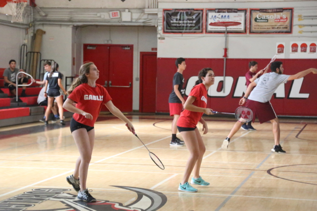 Gables hits the shuttlecock right back to their opponents during their match against Miami Springs.