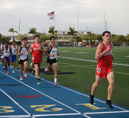 Junior Cavan Wilson leads during the 3200-meter run.