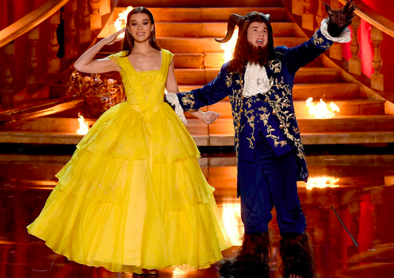 Adam DeVine and Hailee Steinfeld on stage as Belle and the Beast during the opening number. 