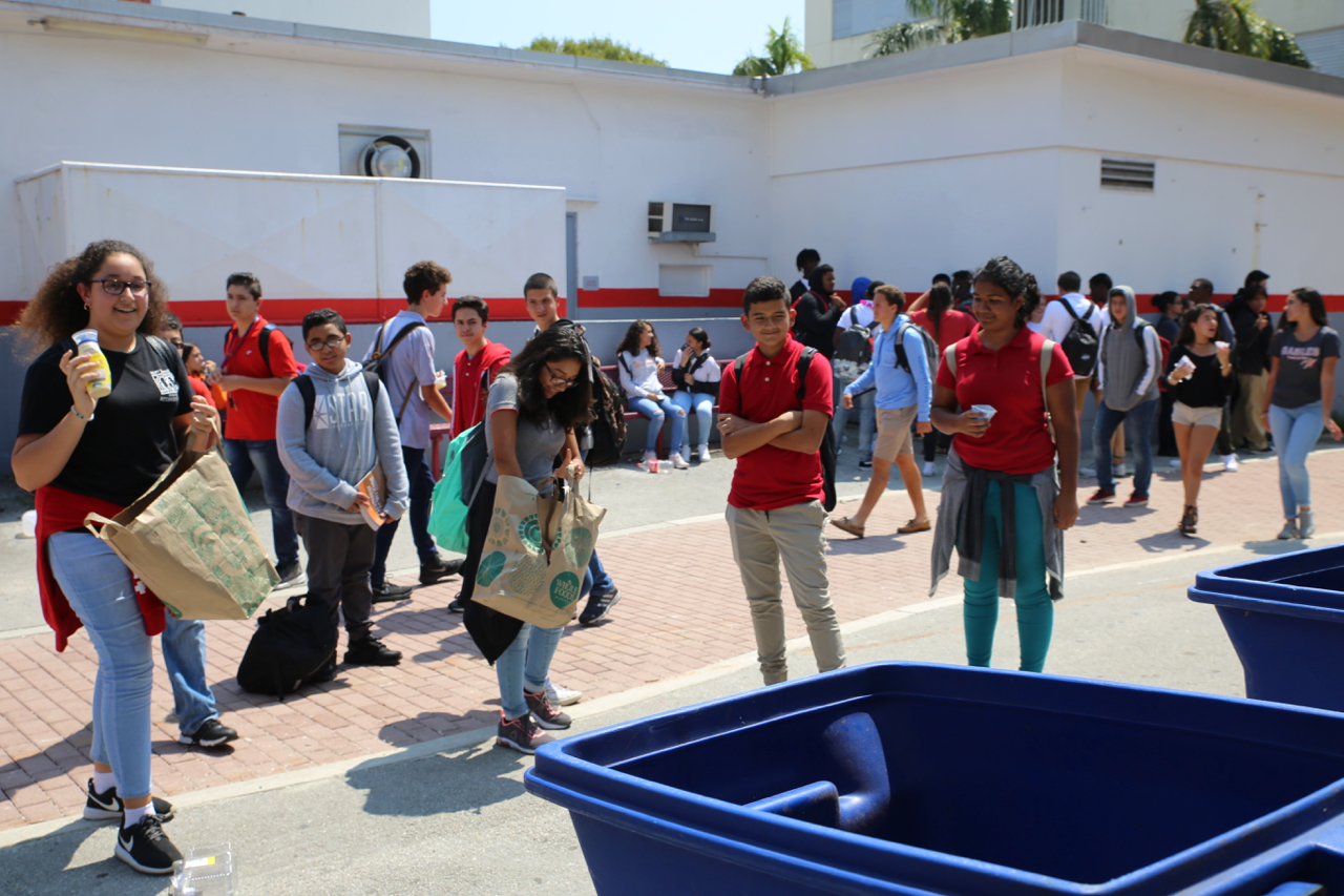 Students play a recycling game set up by Gables Earth.