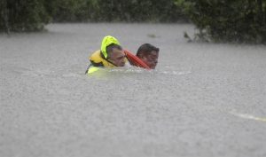 Victims of Hurricane Harvey attempting to seek refuge from the floods that have resulted from the storm.