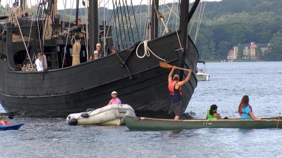 The native protesters blocking the arrival of the replicated Columbus ships. 