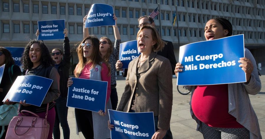 Women gather to protest Jane Doe being denied her right to abort.