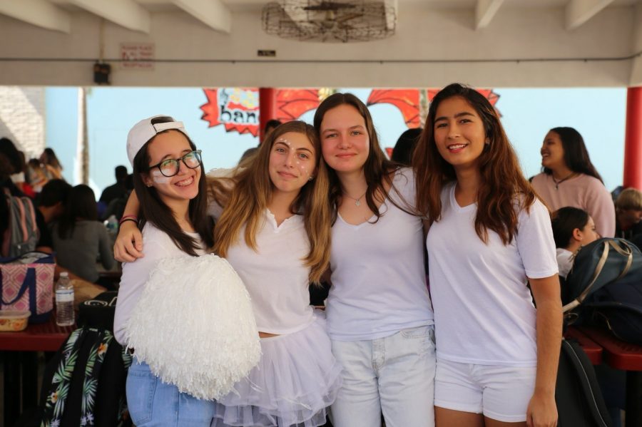 Four+students+dressed+in+white