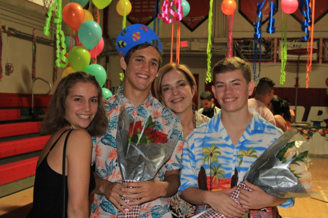 Student Activities Director Ms. Suarez poses with her students at the last Coral Gables Senior High homecoming dance in 2017. 