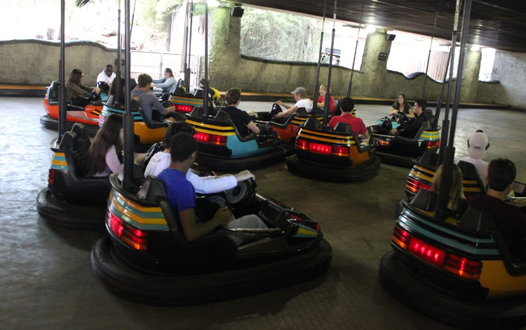 Students take a break from the rides and enjoy the go carts.