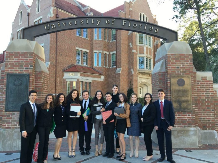 The Model UN team posing in front of one of the main entrances to the University of Florida before committee