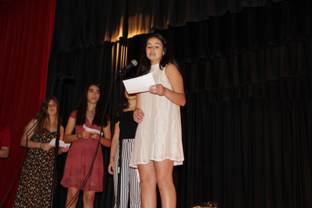 IB Freshman Sara Rabell congratulates the class in Catalan.