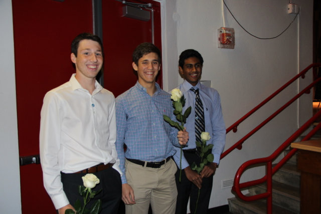 IB Juniors smile for a picture after being pinned.