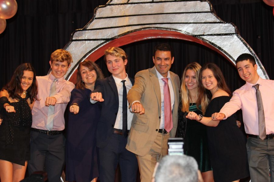 Class of 2019 officers smile with their sponsor, Ms. Depaola, after receiving a ring