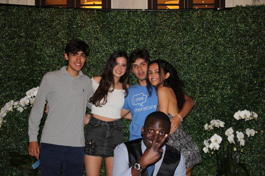 Junior guests Ivan Perez-Hernandez, Mariam Vela, Gabriella Morales, Udeme Ekpo, and helper Patrick Ales smile for a picture.