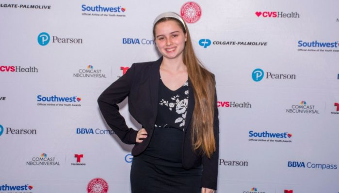 Yanik Ariste striking a pose at the Hispanic Heritage Foundation's 19th Annual Youth Awards.