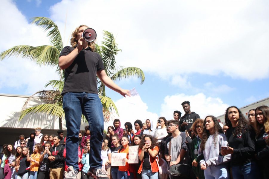 Students protesting in front of the Ralph Moore Building.