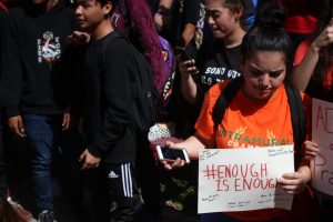 Coral Gables Senior High students stand in unity in front of the Ralph Moore building. 