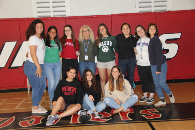 Seniors displaying their future schools colors.