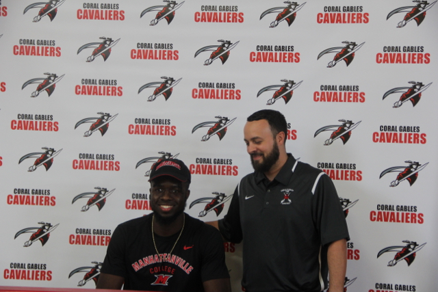 Chris Brown dons Manhattansnville College athletic clothing while making his commitment.