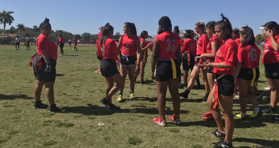 The Lady Cavs patiently waited for the second half of the game to commence. 