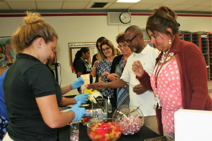 Teachers getting free candy from students for Teacher Appreciation week.