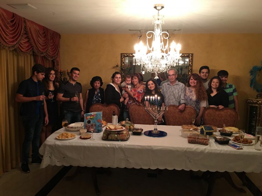 Amy Kaplan celebrating Hanukkah with her family.