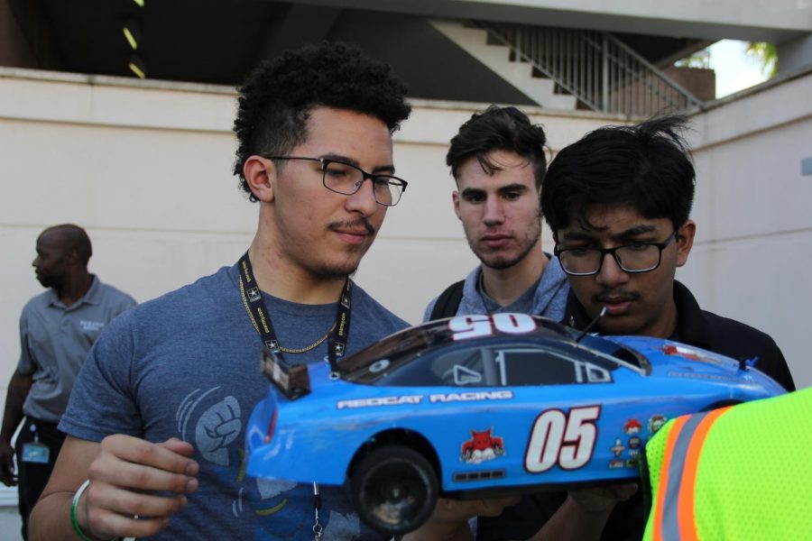 Coral Gables Senior High School students prepare to enter their plastic bottle car in the SECME competition. 