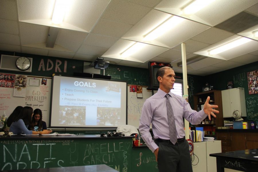 Biology teacher Eric Molina introduces parents to his classroom structure.