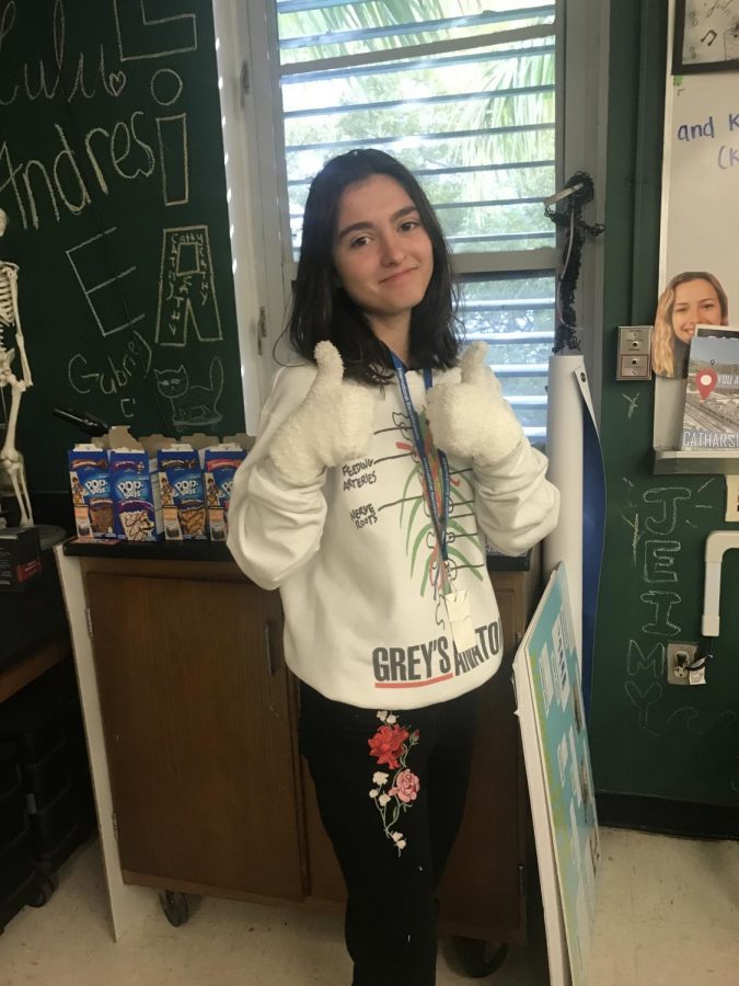 Junior Yazmin Quevedo wearing mittens. 