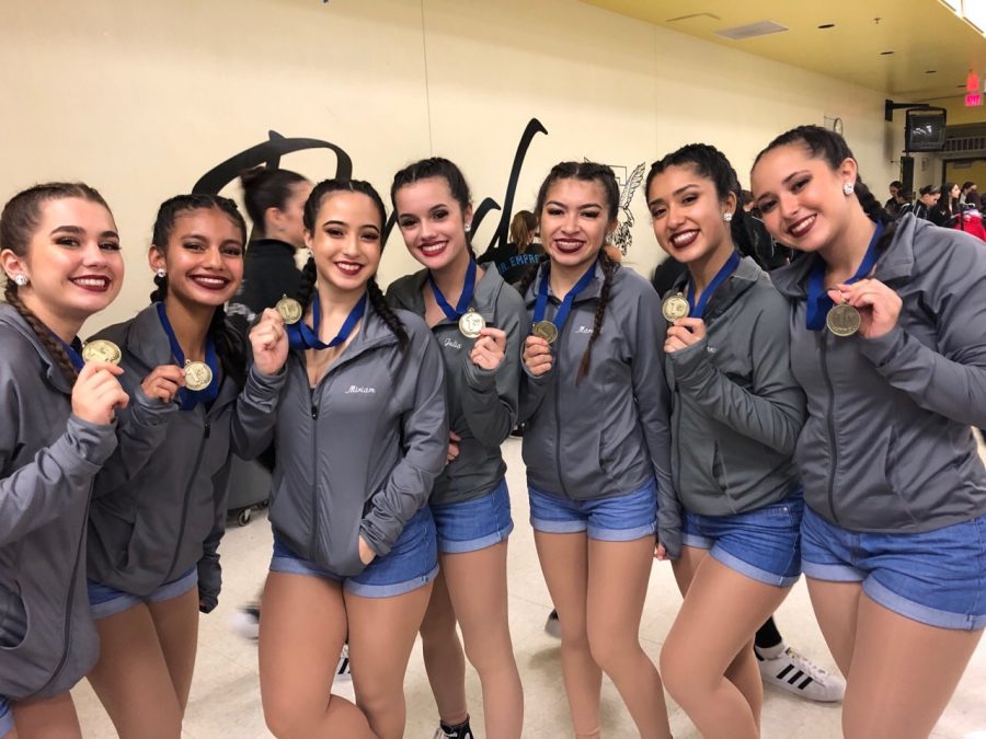 The Ensemble group dance proudly poses with their first overall medals at the ADA Regional Competition