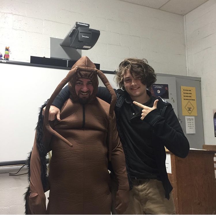 Mr. Reich in his ultimate form, "Gregor," with junior Ty Almeida.