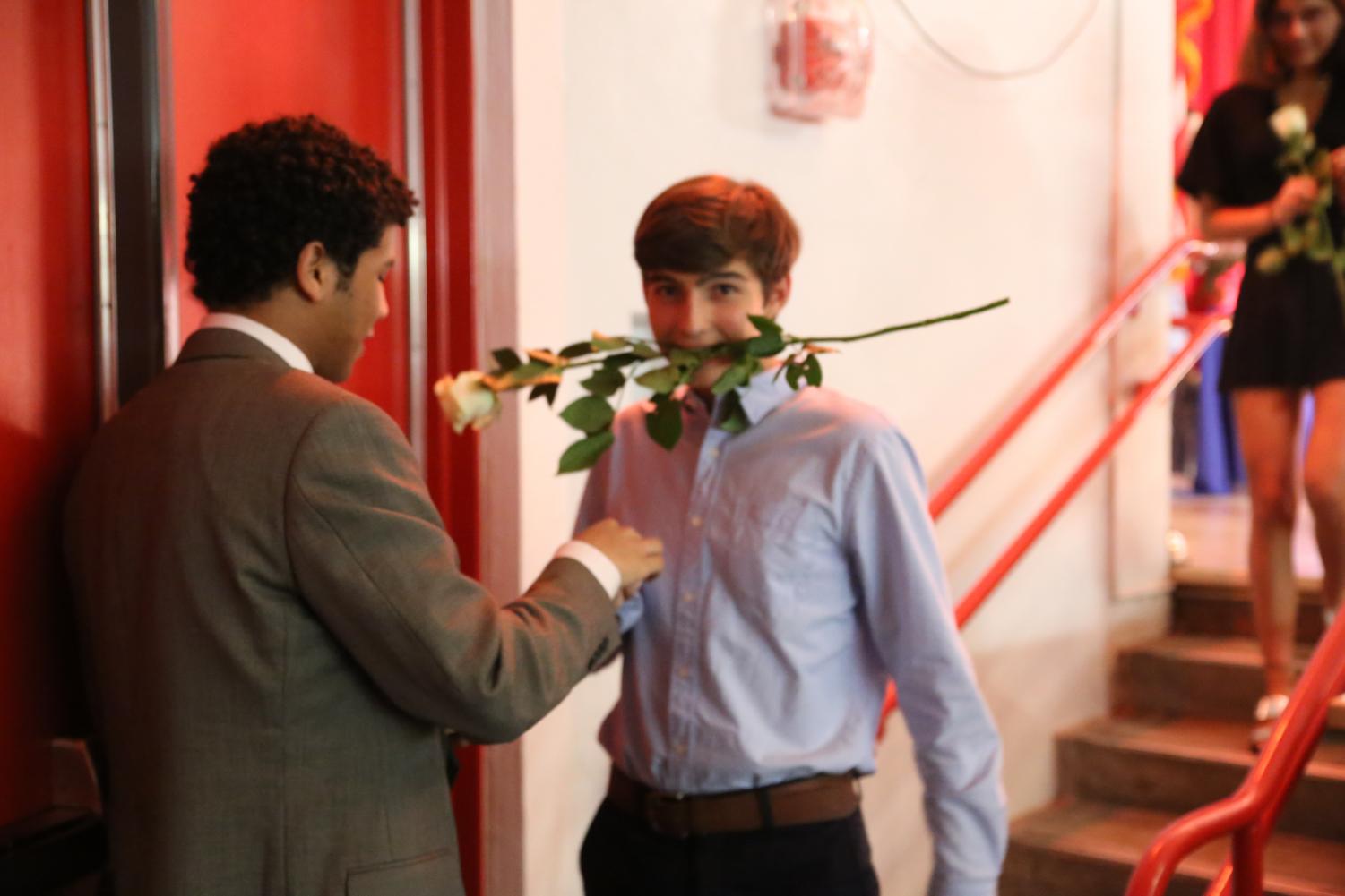 Juniors Participate in IB Pinning and Junior Ring Ceremony