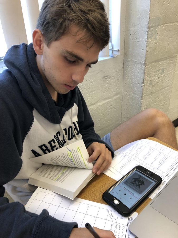 Nicholas Schmidt appreciates the musical excellence of Queen, listening to the relaxing tunes while he derives mathematical equations.