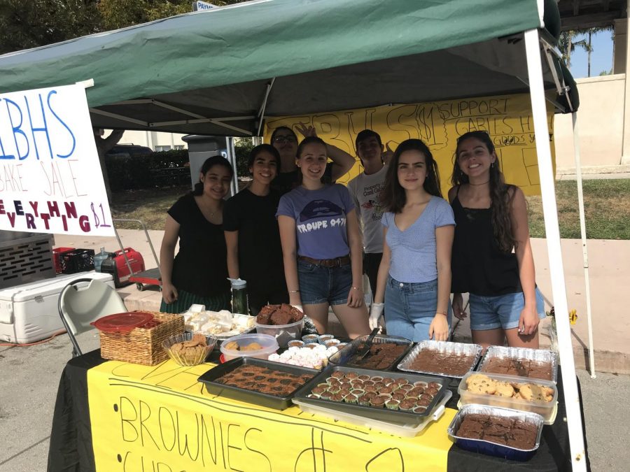 The IBHS board at the Farmer's Market for their bake sale!
