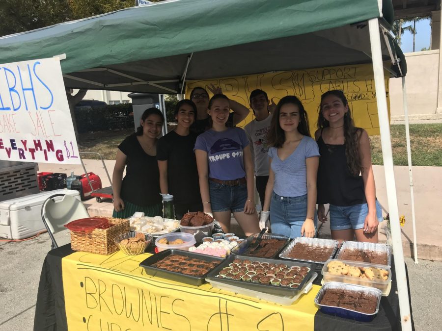 The IBHS board members selling their baked goods.